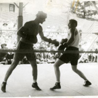 Tunney_Gene_vs_unidenitied_boxer_T-35_8-29-1927_.jpg