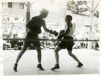 Tunney_Gene_vs_unidenitied_boxer_T-35_8-29-1927_.jpg