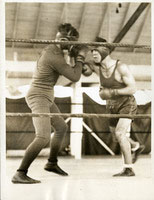 Schmeling_vs_unidentified_boxer_S-50_9-3-1932.jpg